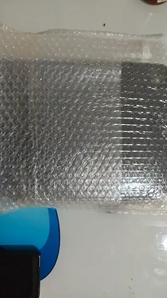 iPad prepared with protective packaging for DHL shipping from Turkey to Germany